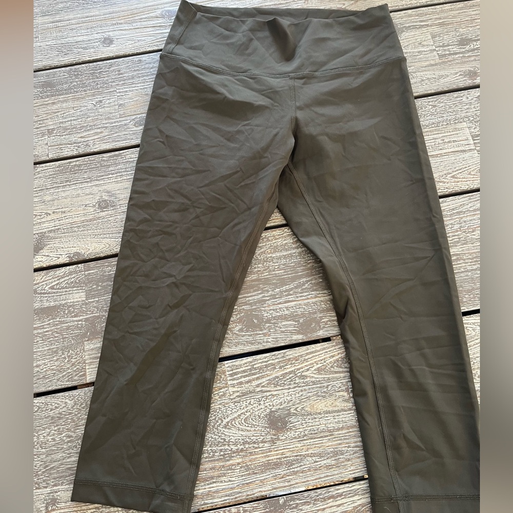 Lululemon army green leggings, size 10, 21” inseam.